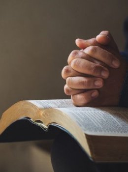 Praying over Bible